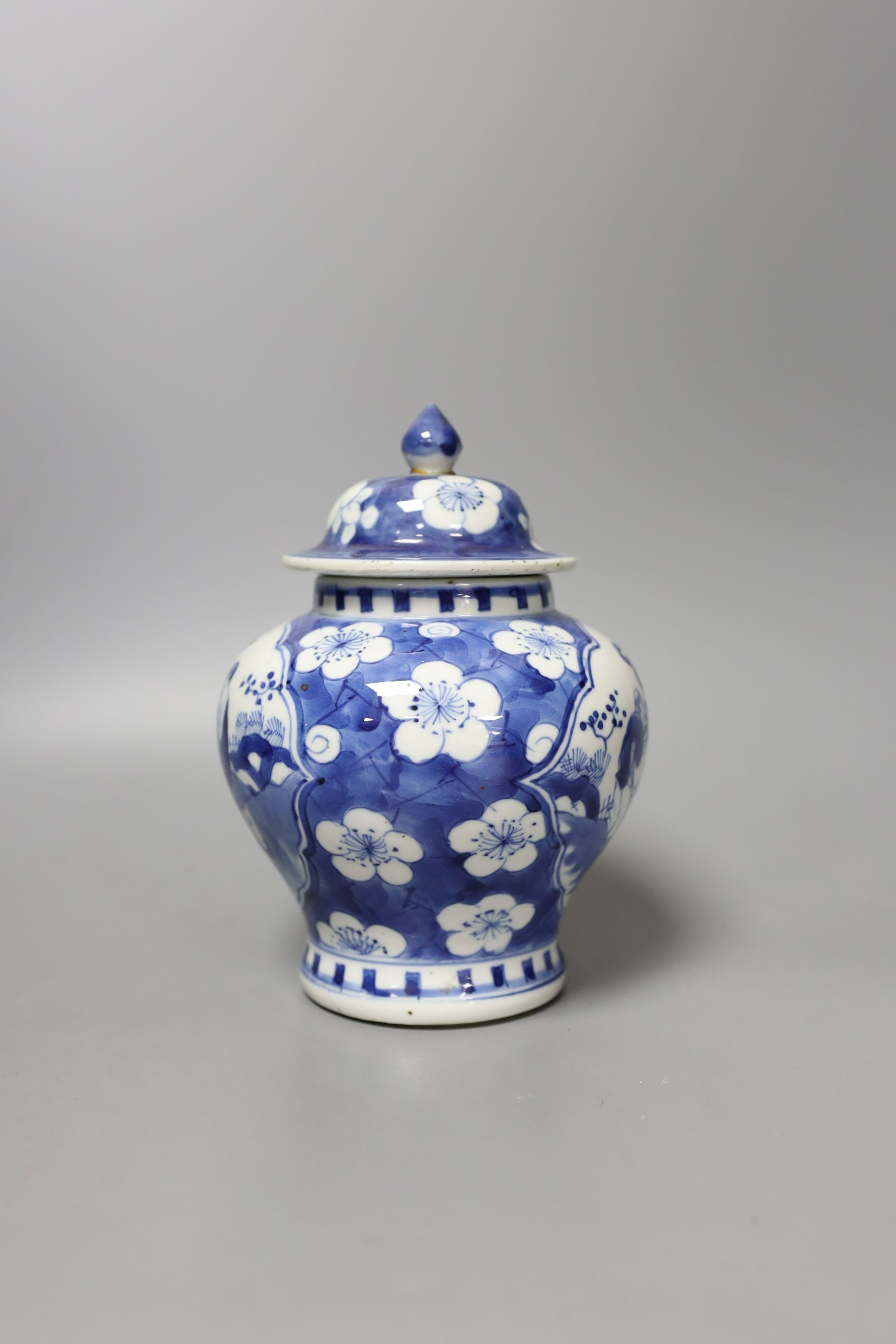 A Chinese blue and white jar and cover, Kangxi mark, 19th century - 18.5cm tall